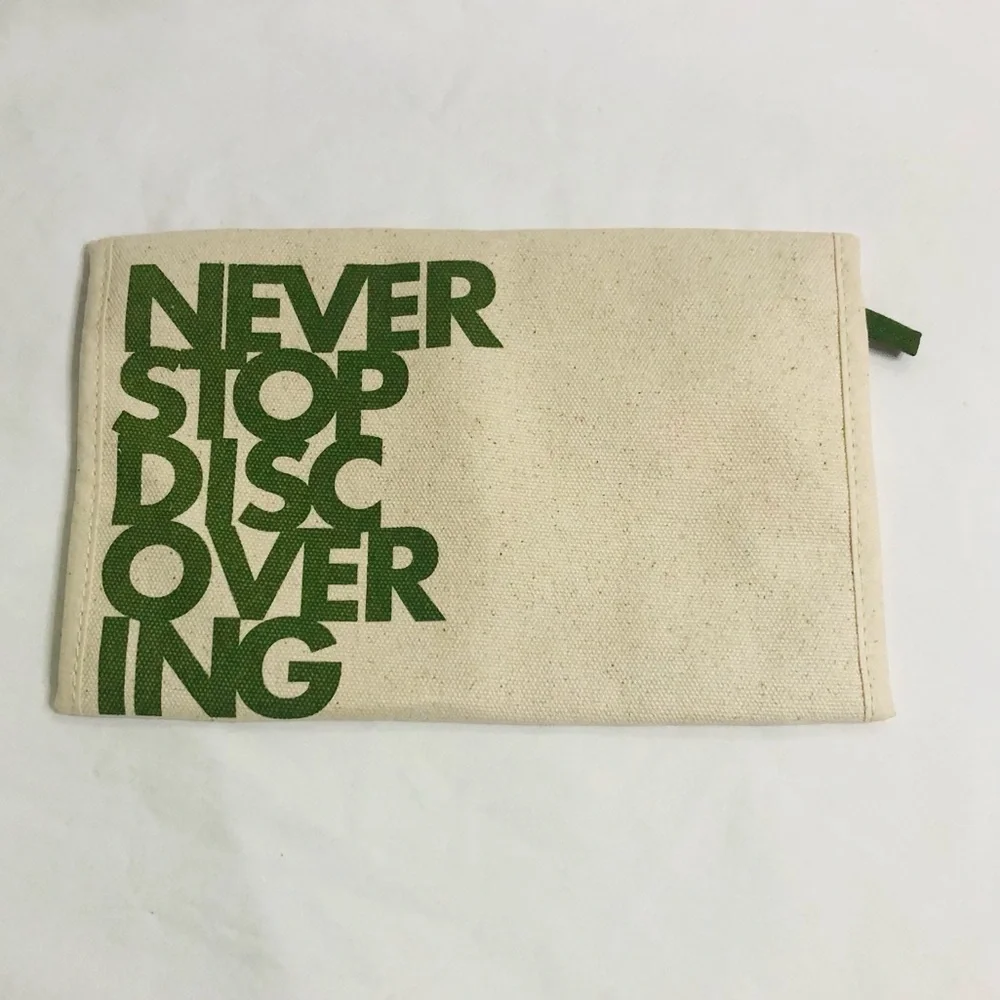Origins cosmetics jewelry canvas pouch Never Stop Discovering beige 10”X 6 1/2”